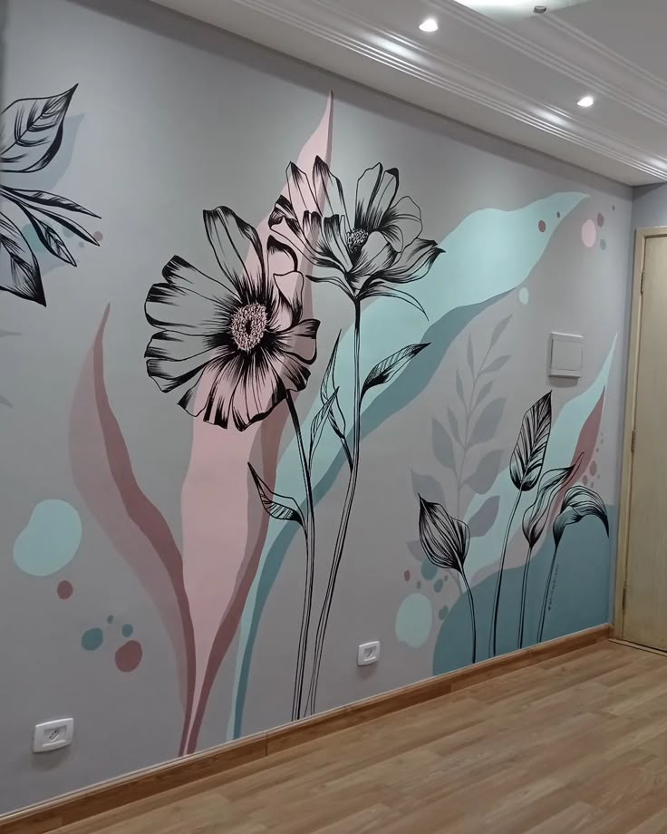 Elegant Floral Wall Mural – Modern Artistic Interior Design A beautifully designed floral mural on an interior wall, featuring black outline flowers with soft pastel shades of pink and blue, creating a modern and elegant aesthetic.