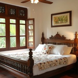 A traditional wooden bed with detailed carved headboard and spindle design, placed in a room with terracotta flooring, wooden ceiling, and large open windows.